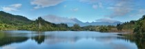 Mt Taranaki from Lake Mangamahoe in New Zealand 