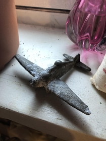 my dad found this little metal airplane while digging in the basement