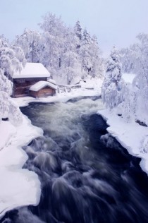 Myllykoski rapid along Kitka river in the winter Finland 