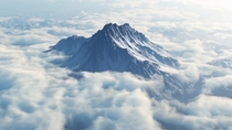 Mytikas looming above the clouds Mount Olympus highest peak Greece 