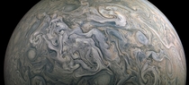 NASAs Juno mission captured these elaborate atmospheric jets in Jupiters northern mid-latitude region This detailed color-enhanced image reveals a complex topography in Jupiters cloud tops