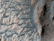 NASAs Mars Reconnaissance Orbiter image of the floor of a large impact crater on Mars 