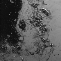 NASAs New Horizons Finds Second Mountain Range in Plutos Heart 
