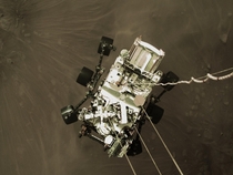 NASAs Perseverance rover being lowered to the surface by the sky crane during yesterdays landing