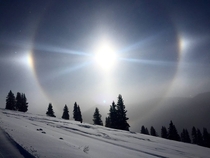 Negative temperatures and a sundog over the mountains today in Colorado 