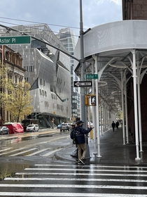 New York City Cooper Union surrounded by beautiful scaffolding and  Cooper Square in the distance Thom Mayne of Morphosis