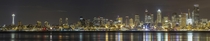 Nighttime panorama of downtown Seattle from the West Seattle waterfront 
