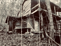 OC Another abandoned property near our house This one has a rather odd backstory In the s a family would stay in the cabin for the summer then one night they all disappeared leaving all of their belongings behind We found numerous blood stained sheets mat