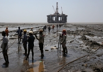 Oil rig waiting to be broken down- Alang Shipyard GujaratIndia May  photograph taken by Amit Dave