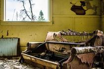 Old couch in an abandoned Montana mining town 