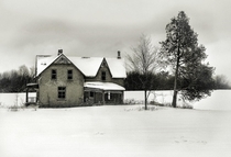 Old house in winter  location unknown