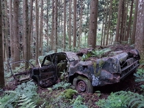 One of many cars in the forest next to Kurama Onsen Kyoto Japan
