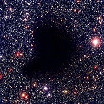 Only  lightyears away and  a lightyear across lies Barnard  a dark molecular cloud that absorbs nearly all visible light from nearby stars Image credit FORS Team -meter VLT Antu ESO