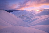 Oregons Painted Hills under a pristine coat of snow  Photo by Alex Noriega xpost from rUnitedStatesofAmerica