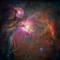 Orion Nebula photographed by the Hubble Telescope More than  stars of various sizes appear in this image some of which have never been seen in visible light Photo credit M Robberto 