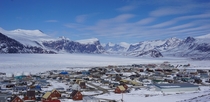 Pangnirtung a tiny hamlet on Canadas Baffin Island surrounded by fjords 