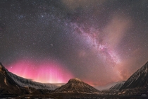 Panorama of the Milky Way and Aurora Borealis over Svalbard 