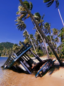 Partially Sunken fishing boat Koh Chang Thailand
