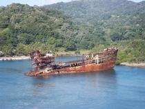 Partially sunken ship Roatn Honduras