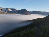 Path leading down into the fog Hornstrandir Nature Reserve Iceland 