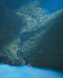 Perched high up in the Olympic Mountains looking down at Lake Cushman Washington State 