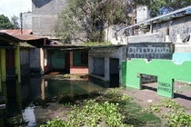 Permanently Submerged Storefronts Lake Atitilan Guatemala  x