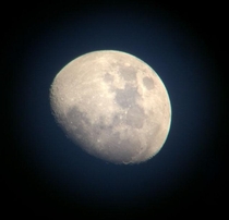 Photo I took of the moon during the afternoon by holding my phone up to a cheap telescope  