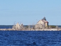 Pilot Island Lighthouse WI Light is automated but fog whistle building is abandoned 