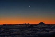 Pre-dawn crescent moon from near the top of Haleakala volcano