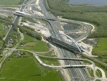 Railway bridge over a major highway under construction in the Netherlands 