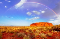 Rainbow over the heart of Uluru Northern Australia 