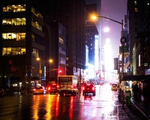 Rainy morning looking down th Avenue towards Times Square in Manhattan NYC USA 