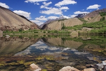 Reflection of the mountains photographer Ghulam Rasool 