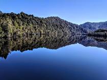 Reflections in the Gordon River South West Tasmania Australia  X  OC
