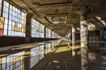Reflections inside an abandoned manufacturing plant
