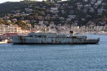 Rotting french hospital ship Rance in front of the Toulon yacht harbour 