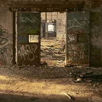 Rusted iron doors in an abandoned half demolished factory in Leipzig 