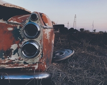 s Datsun roadster left abandoned in a field Howard Texas