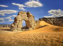 Sahara natural rock arch Libya  by Patrick Galibert
