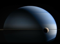 Saturn and its moon Titan in near-infrared processed using methane absorption band data captured by Cassini in May  NASAJPL-CaltechSSICICLOPSKevin M Gill