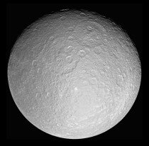 Saturns icy moon Rhea in her full crater-scarred glory 