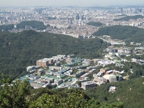 Seoul National University complex with the sprawling city in the background Seoul South Korea 