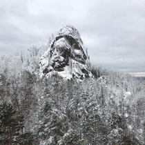 Siberian rock in snow