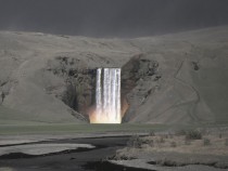 Skgafoss waterfall during the last Eyjafjll volcanic eruption 