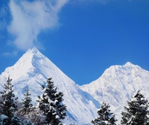 Smoke Rising From a Chimney  - Panchachuli V and IV Indian Himalayas L- R
