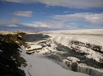 Snow covered Gullfoss Waterfall Iceland in March  