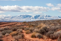 Snow Dusted mountains in the distance Taken on a hike near St George Utah 