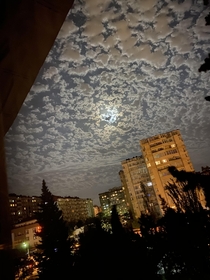 Someone told me to post it here Just a pic of the Moon and clouds I took yesterday during the penumbral lunar eclipse around  local time Baku Azerbaijan