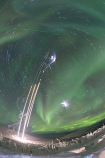 Sounding Rockets Launch Into an Aurora - Composite shot of all four sounding rockets for the M-TeX and MIST experiments 