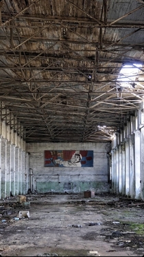Soviet propaganda outlived factories and plants Still hanging although the plant is abandoned